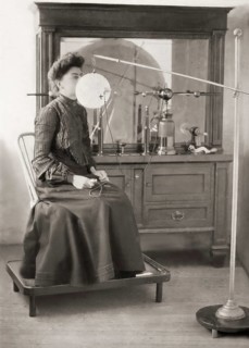 A patient being treated by Proffessor Wilhelm Conrad Röntgen with an ozone inhalation treatment, an