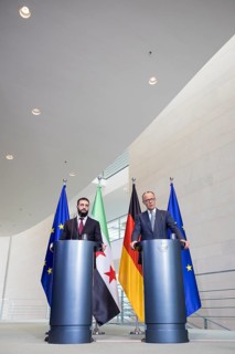 Ahmed al-Sharaa (President of the Syrian Arab Republic) and Friedrich Merz (Chancellor of the