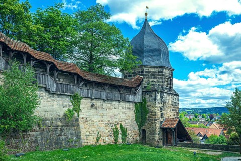 Historic town wall with battlements and witches' tower in Kronach, Germany