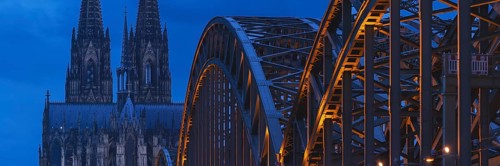 Cologne Cathedral and the Hohenzollern Bridge illuminated with LED lights, Cologne, North