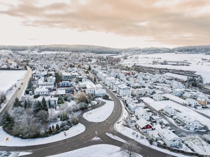 Winter landscape of a village with streets and structure in the snow, Calw- Stammheim, Black