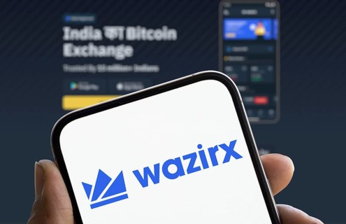 WazirX logo is displayed on smartphone. WazirX is an Indian cryptocurrency trading platform