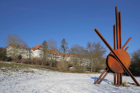Metal sculpture, rusty steel bars, modern art, abstract art, winter, snow, Hotel Restaurant