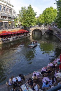 The old town centre of Utrecht, Oudegracht, around 2 km long with many old houses, shops,