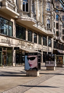 The typical and partly historic display cases for advertising along Boulevard Kurfürstendamm,