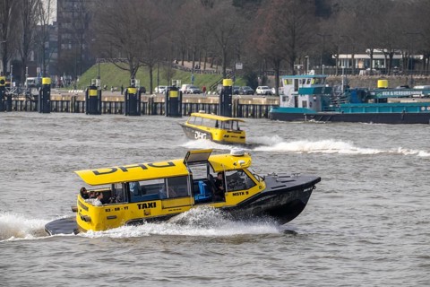 Water taxi, water taxi on the Nieuwe Maas, taxi rides on the river with small speedboats,