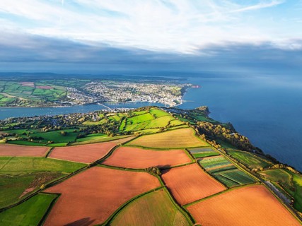 Colours of autumn Fields and Farms over Sheldon from a drone, Torbay, Devon, England, United