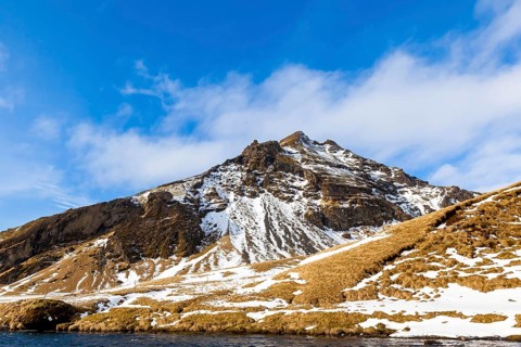 Iceland, landscape at Skogafoss, rocks, snow, onset of winter, Skogafoss, Iceland