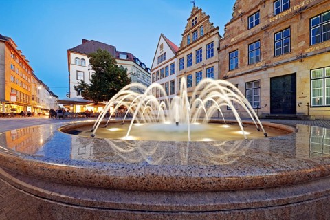 Old market with fountain and town houses in the evening, Bielefeld, East Westphalia-Lippe, North
