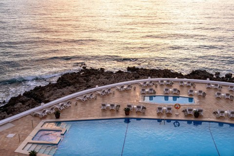 Swimming pool and sun loungers, Cala Rajada, Majorca, Spain