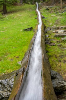 Wooden channel of the Kandelwaal, Martell, South Tyrol, Italy