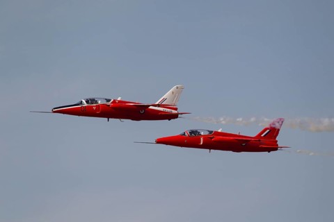 Folland Gnat two aircraft in RAF Royal air force colours flying, England, United Kingdom