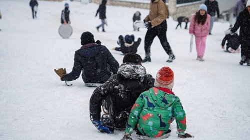 In Gaziantep, Turkey, on December 31, 2025, children and families enjoy winter activities as they