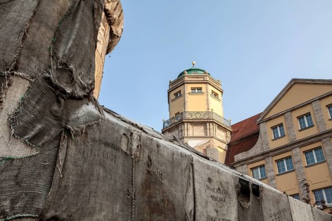 Torwache wrapped with old jute sacks, Check Point Sekondi Loco, by artist Ibrahim Mahama, documenta