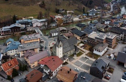 Drone shot, view of town with parish church, Bruck an der Glocknerstraße, Pinzgau, Salzburg