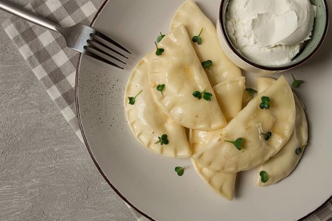 Pierogi, a traditional dish of Polish cuisine, dumplings, top view, close-up, no people