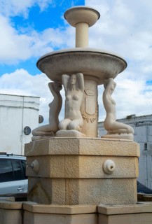 Fountain in Pisticci showing naked female bodies in Basilicata region, Italy, Southern Europe