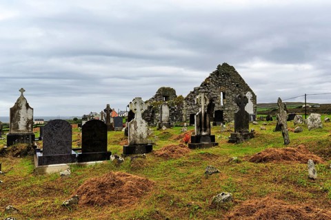 Celtic crosses in front of a ruin, Kilcatherine church and cemetery, Ring of Beara coastal road,