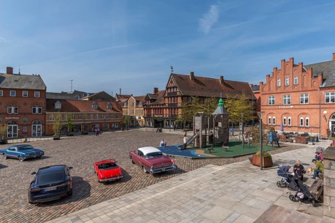 Svendborg Old Town, Torvet, market square, cobblestones, playground, old cars, stepped gabled