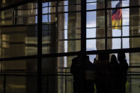 German flag and visitors at the German Bundestag, Berlin, 11.04.2024