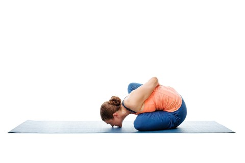 Woman doing Ashtanga Vinyasa Yoga stretching asana Marichyasana B, pose posture dedicated to sage