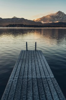 Frosty morning atmosphere during sunrise at Lake Hopfensee in the Allgäu in Bavaria, Germany