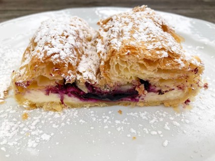 Curd cheese strudel with blueberries, delicious dessert on the mountain pasture, East Tyrol,