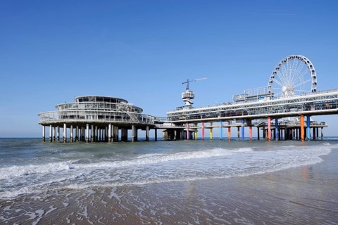 Pier with bungy jumping tower and Ferris wheel, Scheveningen, The Hague, Dutch North Sea Coast,