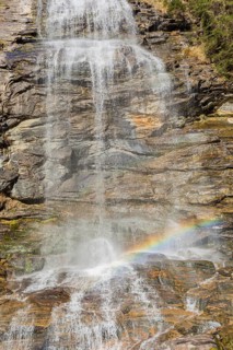 Rainbow. Melnikfall, a waterfall located at the Malta Hochalm road. Carithia, Austria