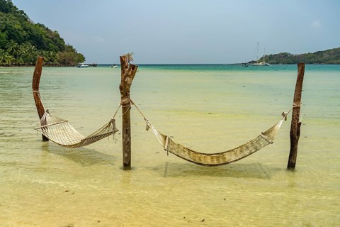 Hammocks in Bang Bao Bay, Ko Kut Island or Koh Kood in the Gulf of Thailand