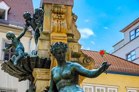 Close-up of the old Anger fountain with allegorical figure, on the Anger in Erfurt, Thuringia,