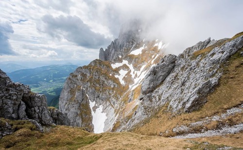 Mountain landscape, low view during the ascent to the Maukspitze, clouds moving around the