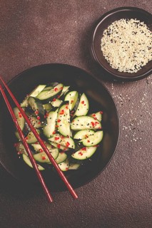 Chinese salad, cucumbers with chili pepper and sesame seeds, homemade, no people