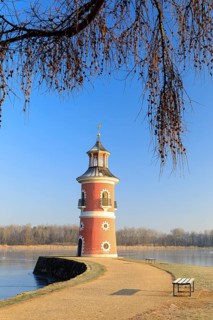 Pier with lighthouse on the large pond near the Fasanenschlößchen, Moritzburg, Saxony, Germany