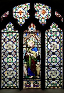 The Good Shepherd, stained glass window, Church of Saint Mary, Mendlesham, Suffolk, England, UK