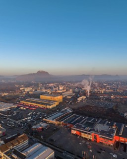 Aerial view of the industrial area of the city of Singen am Hohentwiel, after sunrise, the