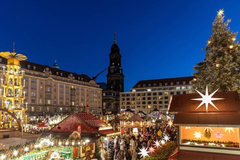 Large pyramid and Christmas tree at the Striezelmarkt Christmas market on the Altmarkt in Dresden,