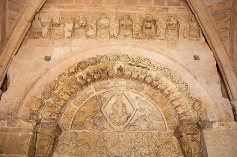 Figures on the Romanesque portal of the Virgen de la Pena church in the historic centre of