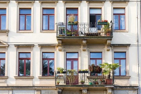 Revitalised balconies of an old building in Görlitzer Straße, Neustadt, Dresden, Saxony, Germany