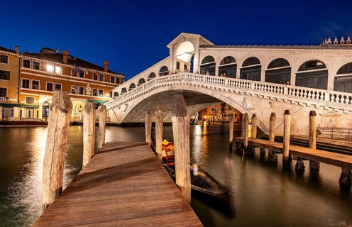 Rialto Bridge and gondolas on the Grand Canal, blue hour, long exposure, Venice, Veneto, Italy