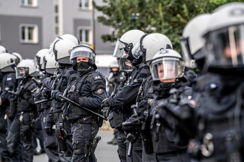 Police officers, police task force, on duty at the demonstration against the AFD party conference
