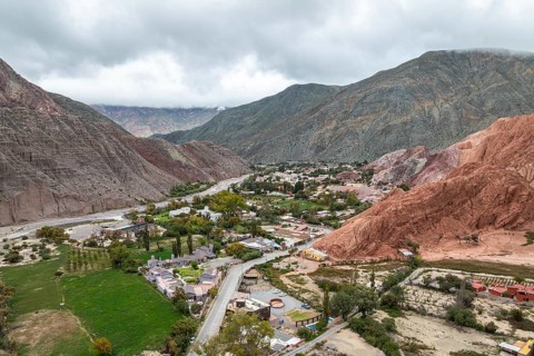 A breathtaking aerial view of Purmamarca in Jujuy, Argentina, showcasing the vibrant valley