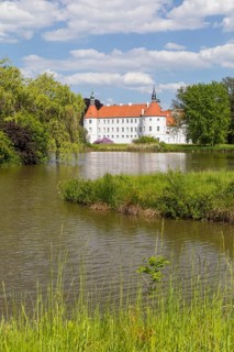 Castle pond and moated castle Fürstlich Drehna, Luckau, Brandenburg, Germany