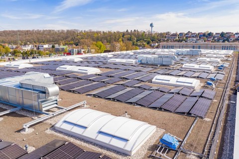 Flat roof with a variety of solar systems and ventilation equipment, PV system at Obi Baumarkt,
