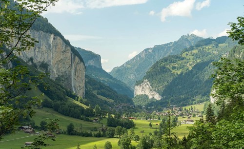 Lush green surroundings encapsulate the serene village nestled in the Lauterbrunnen valley,