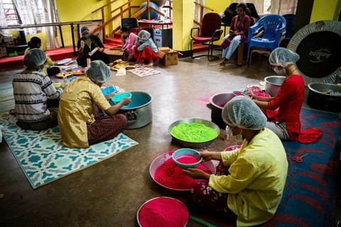 Students of Ashaneer Home makes organic coloured powder ahead of Holi Festival, in Guwahati, India