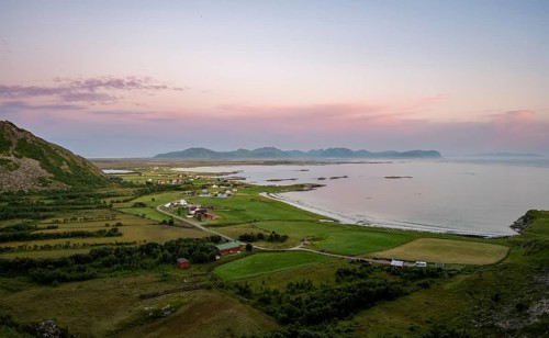 View of coastal landscape with the village of Stave at sunset, Andøya Island, Vesterålen, Nordland