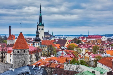 Aerial view of Tallinn Medieval Old Town with St. Olaf's Church and Tallinn City Wall. Tallinn,
