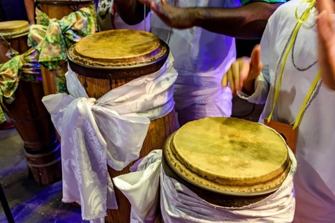 Decorated drums in a nighttime Umbanda religious ceremony, Brazil