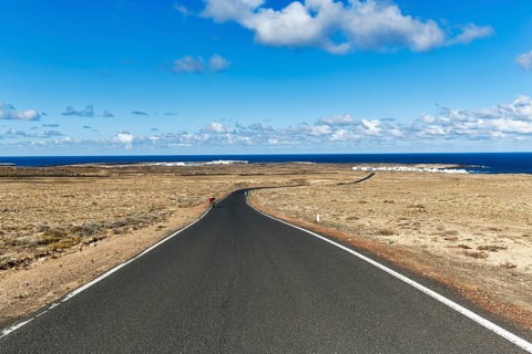 Empty country road, coastline, El Jable, Lanzarote, Canary Islands, Spain